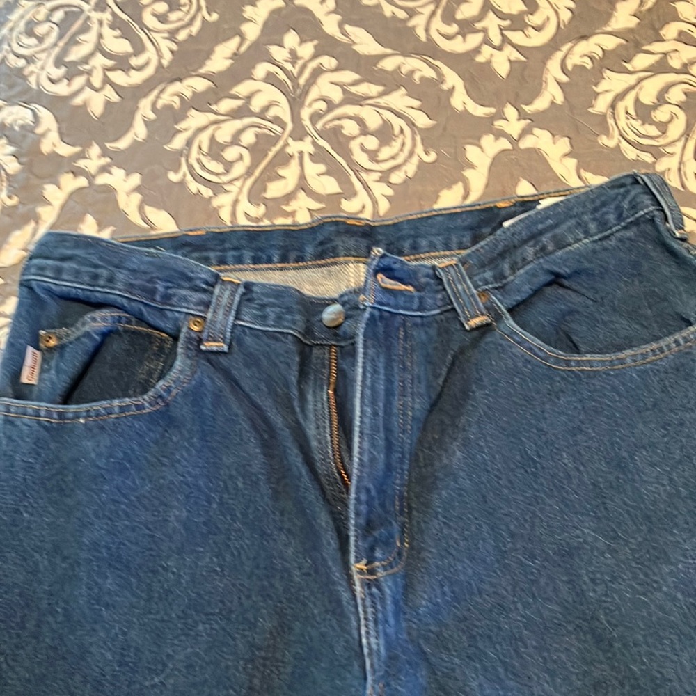 Carhartt men’s jeans. Like new. Relaxed fit. I have two pairs available.